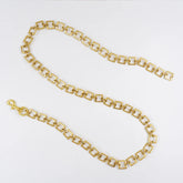 Gilt square chain waist belt with brass tassel in old gold
