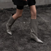Pointed toe knee-high boot with kitten heel in cowhide