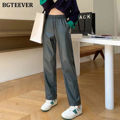 Elastic waist straight faux leather trousers with drawstring