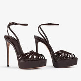 Pointed toe platform sandal with narrow band and thin heel