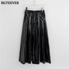 A-line long pleated skirt in silver with high waist