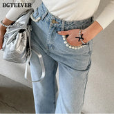 High waist loose jeans with pearl button detail
