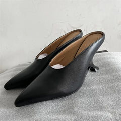 Alien heel mule slipper in silver and black