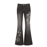 Low waist flared jeans with flower embroidery in slim fit