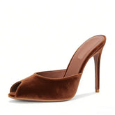 Pointed toe stiletto slipper in solid suede