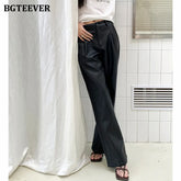 High waist wide-leg long trousers in PU leather with side pockets