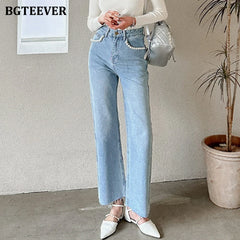 High waist loose jeans with pearl button detail