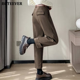 Warm harem pants in woolen fabric with pockets for winter