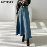 A-line denim skirt with pockets, high waist, and split hem