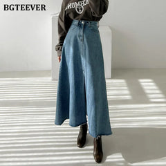 A-line denim skirt with pockets, high waist, and split hem