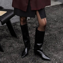 Pointed toe knee-high boot with kitten heel in cowhide
