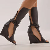 Wedge hollow sandal boot with round peep toe in solid leather