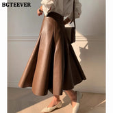 A-line loose skirt in faux leather with high waist
