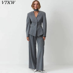 Pinstripe blazer two-piece set with choker neck and wide-leg pants