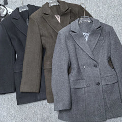 Dark brown double-breasted blazer with button cuff in textured fabric