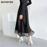 A-line mid-length mesh skirt with high waist and loose fit
