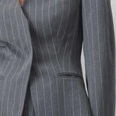 Pinstripe blazer two-piece set with choker neck and wide-leg pants