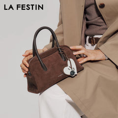 Barrel Boston bag in suede