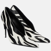 Pointed toe stiletto pump in zebra print suede