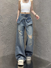 High waist wide-leg ripped jeans with patch detail
