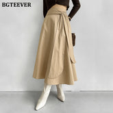 A-line long striped skirt with lace-up and irregular hem