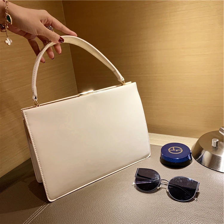 Vintage clip-top tote in PU leather
