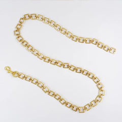 Gilt square chain waist belt with brass tassel in old gold