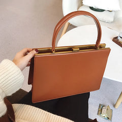 Vintage clip-top tote in PU leather