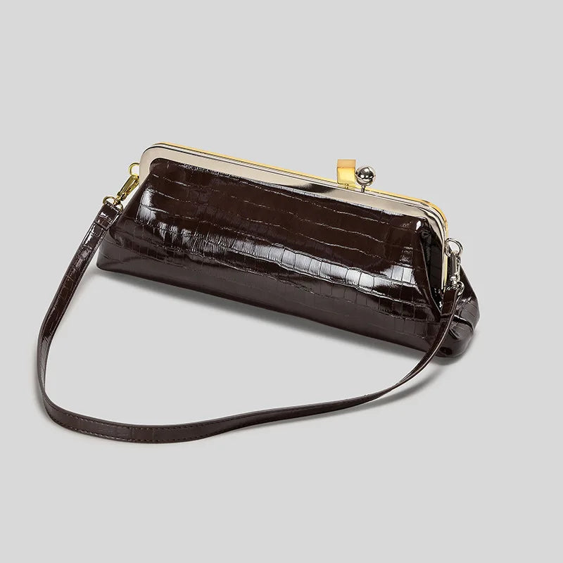 Long frame clutch with kiss lock closure