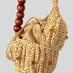 Conch shell woven straw bag with bead strap