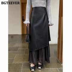 Slim PU leather skirt with mesh patchwork panel