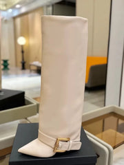 Pointed toe knee-high boot with thin high heel and belt buckle