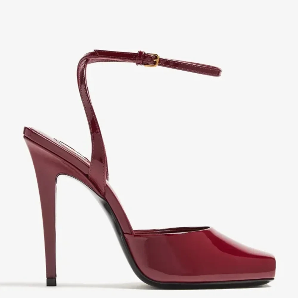 Open toe thin heel pump in shiny green patent leather