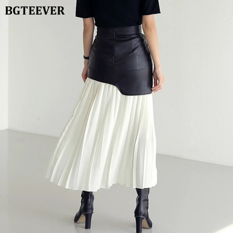 A-line mid-length pleated skirt in PU leather patchwork with high waist