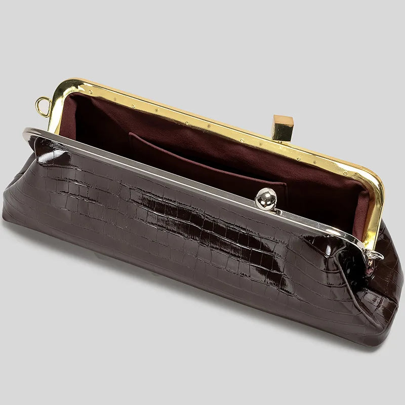 Long frame clutch with kiss lock closure