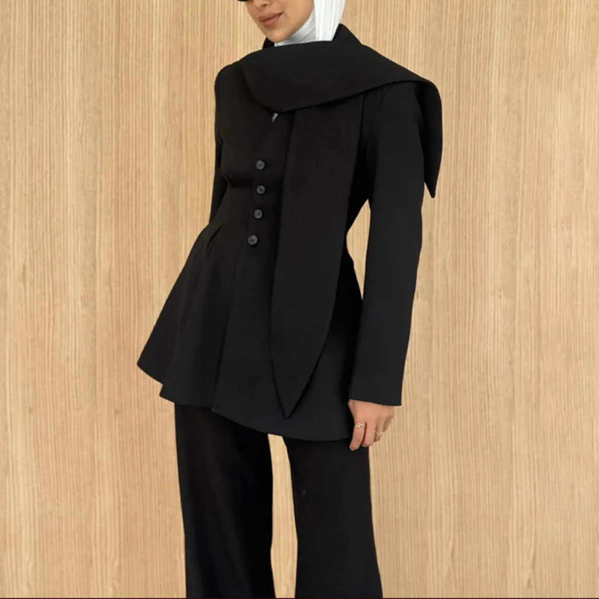 Asymmetric draped collar peplum blazer with structured shoulder