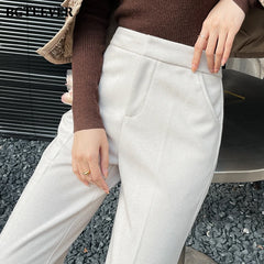 High waist thick harem pants in woolen fabric with pockets
