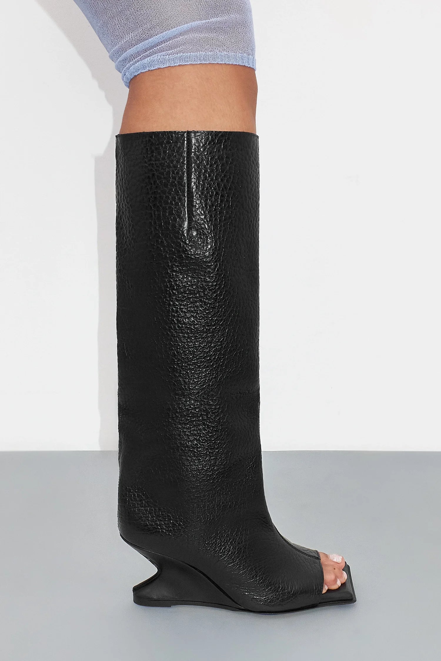 Square toe knee-high boot with high heel in stone pattern