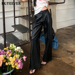 High waist wide-leg long trousers in PU leather with pockets