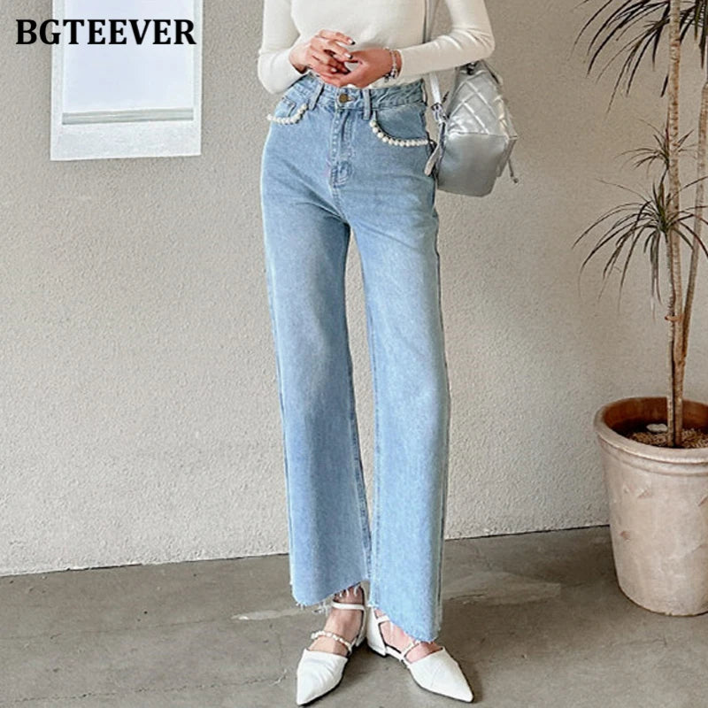 High waist loose jeans with pearl button detail