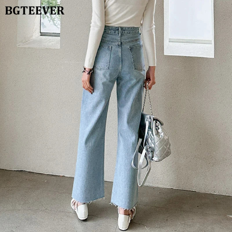 High waist loose jeans with pearl button detail