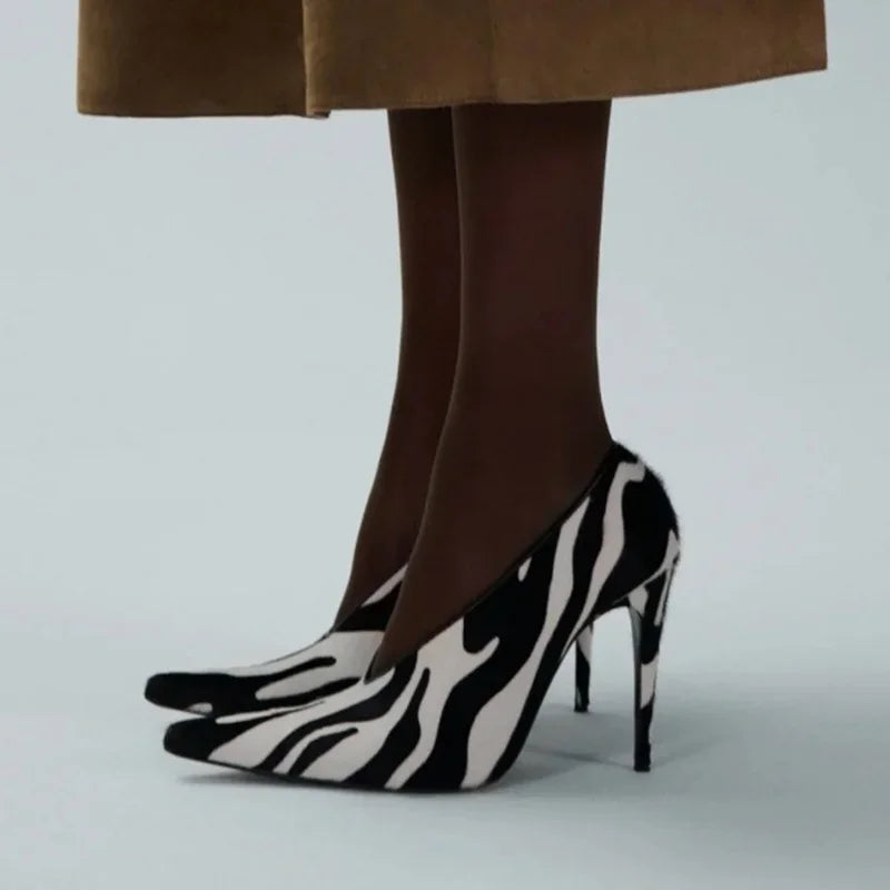Pointed toe stiletto pump in zebra print suede