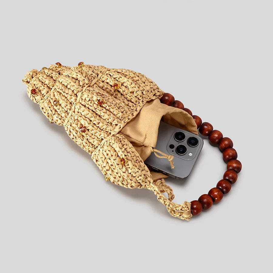 Conch shell woven straw bag with bead strap