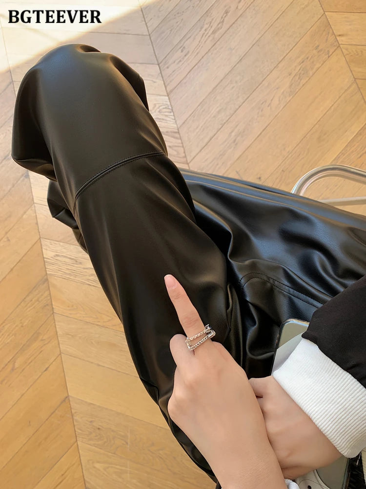 Elastic waist straight faux leather trousers with drawstring