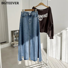 A-line denim skirt with pockets, high waist, and split hem