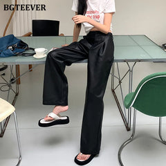 High waist wide-leg long trousers in PU leather with side pockets