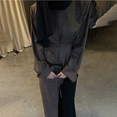 Linen blazer with tie waist and asymmetric hem in dark brown