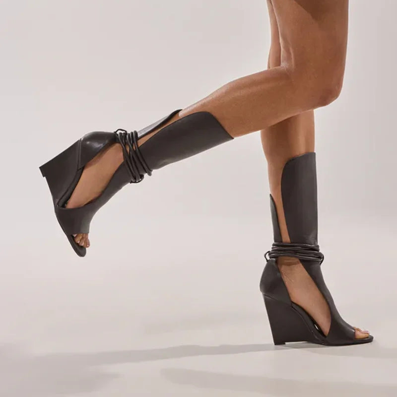 Wedge hollow sandal boot with round peep toe in solid leather
