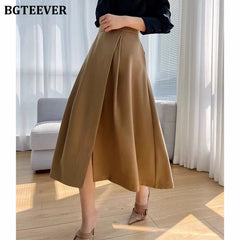A-line mid-length split skirt with pockets and high waist