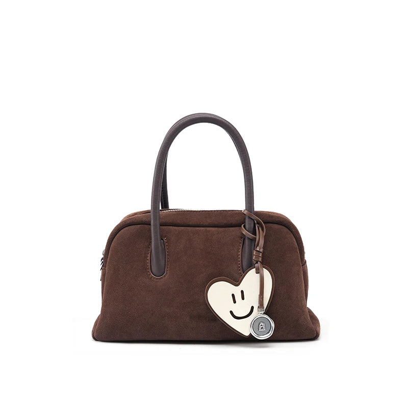 Barrel Boston bag in suede